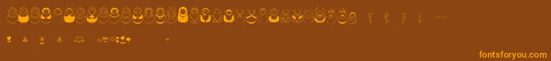 Matriochkas Font – Orange Fonts on Brown Background