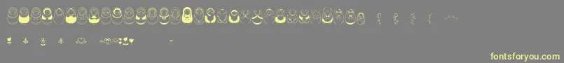 Matriochkas Font – Yellow Fonts on Gray Background