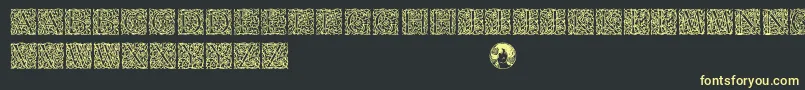 Arabesque-Schriftart – Gelbe Schriften auf schwarzem Hintergrund