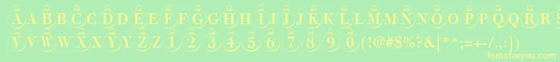 ChristmastreeRegular Font – Yellow Fonts on Green Background