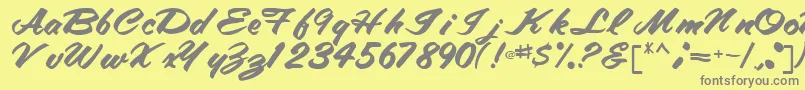 TracyRegular-fontti – harmaat kirjasimet keltaisella taustalla