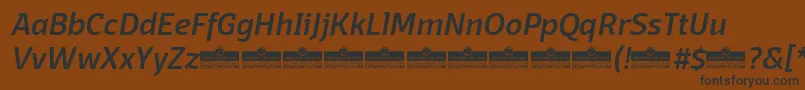 DomotikaMediumItalicTrial-fontti – mustat fontit ruskealla taustalla