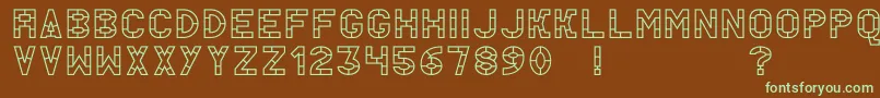 フォントAcThermesOutline – 緑色の文字が茶色の背景にあります。
