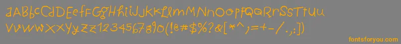 ChildwrittenBold-Schriftart – Orangefarbene Schriften auf grauem Hintergrund
