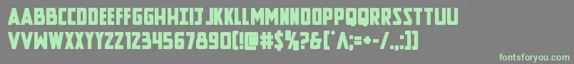 フォントNewcomictitlebold – 灰色の背景に緑のフォント