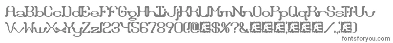DraggleOverKernedBrk-fontti – harmaat kirjasimet valkoisella taustalla