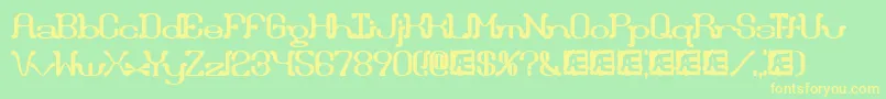 DraggleOverKernedBrk Font – Yellow Fonts on Green Background