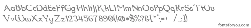 フォントDumbledor2RevItalic – 白い背景に灰色の文字