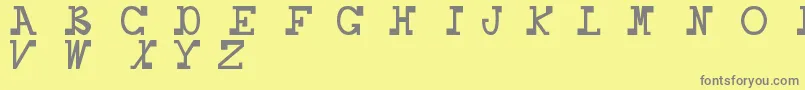 フォントDaboss – 黄色の背景に灰色の文字