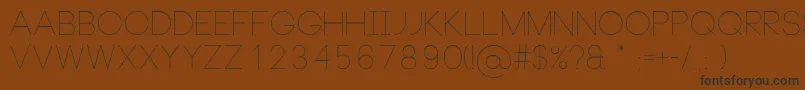 NeouThin Font – Black Fonts on Brown Background