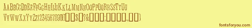 フォントAnhedoni – 茶色の文字が黄色の背景にあります。