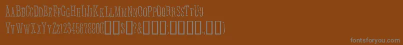 フォントAnhedoni – 茶色の背景に灰色の文字