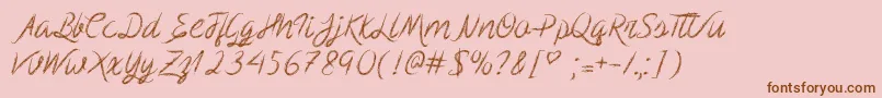 Fonte ScribbleScript – fontes marrons em um fundo rosa