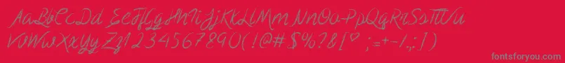 Fonte ScribbleScript – fontes cinzas em um fundo vermelho