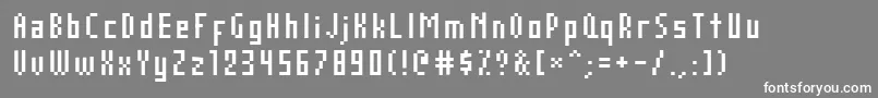 フォントAuxDotbitcCond – 灰色の背景に白い文字