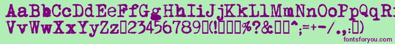 MomsTypewriter-fontti – violetit fontit vihreällä taustalla