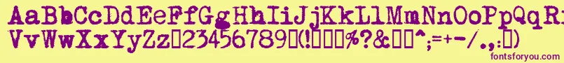 MomsTypewriter-fontti – violetit fontit keltaisella taustalla