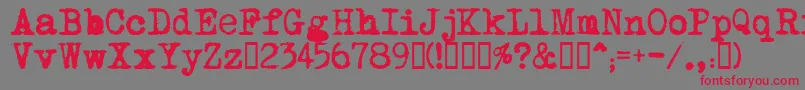 MomsTypewriter Font – Red Fonts on Gray Background