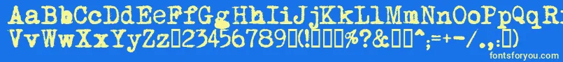 MomsTypewriter-Schriftart – Gelbe Schriften auf blauem Hintergrund