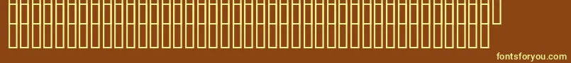Uzdorogi-fontti – keltaiset fontit ruskealla taustalla