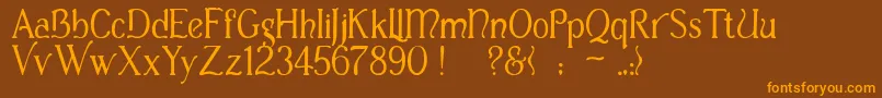 フォントCasua – オレンジ色の文字が茶色の背景にあります。