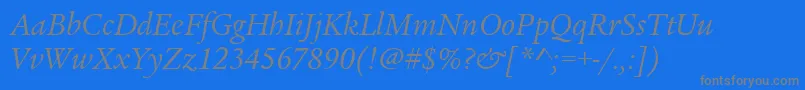 フォントLegacySerifItcTtBookitalic – 青い背景に灰色の文字