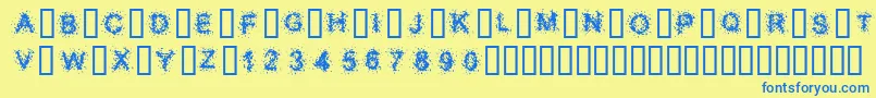 SplatterCaps-Schriftart – Blaue Schriften auf gelbem Hintergrund