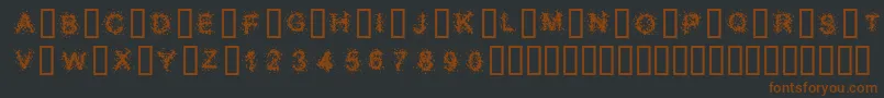 SplatterCaps-Schriftart – Braune Schriften auf schwarzem Hintergrund