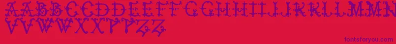 Czcionka ElizabethanInitialsTfb – fioletowe czcionki na czerwonym tle