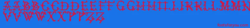 ElizabethanInitialsTfb Font – Red Fonts on Blue Background