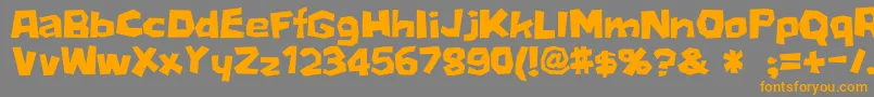フォントD3Stonism – オレンジの文字は灰色の背景にあります。
