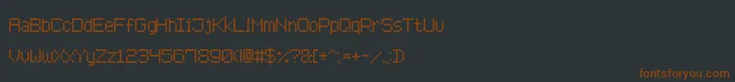 Шрифт AdvancedPixel7 – коричневые шрифты на чёрном фоне