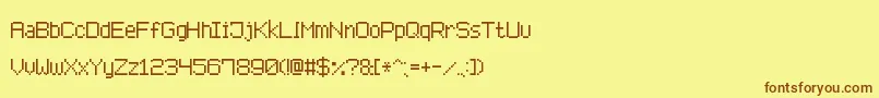Fonte AdvancedPixel7 – fontes marrons em um fundo amarelo