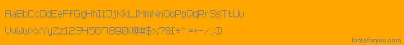 AdvancedPixel7-fontti – harmaat kirjasimet oranssilla taustalla