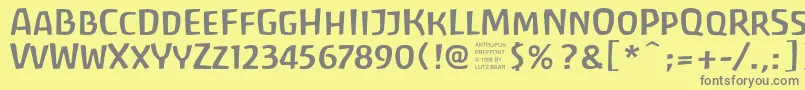 フォントAntrf – 黄色の背景に灰色の文字