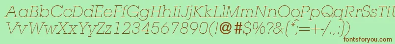 フォントL850SlabLightItalic – 緑の背景に茶色のフォント