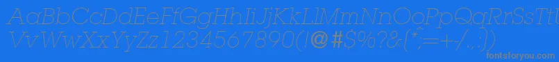 フォントL850SlabLightItalic – 青い背景に灰色の文字