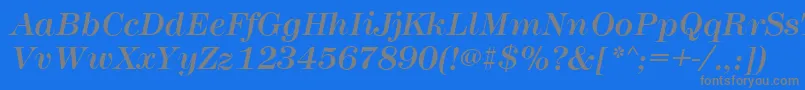 MontpellierItalic-fontti – harmaat kirjasimet sinisellä taustalla