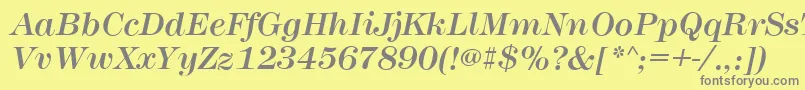 MontpellierItalic-fontti – harmaat kirjasimet keltaisella taustalla