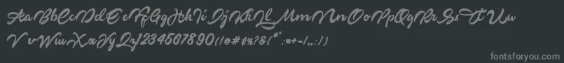 Markinson-fontti – harmaat kirjasimet mustalla taustalla