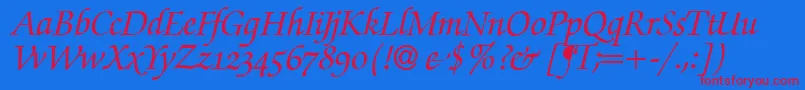 フォントZabriskiescriptswashBolditalic – 赤い文字の青い背景