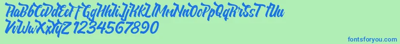 NeldaFree Font – Blue Fonts on Green Background