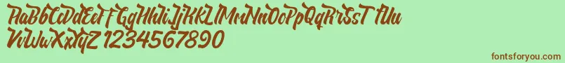 NeldaFree Font – Brown Fonts on Green Background