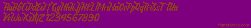 NeldaFree-Schriftart – Braune Schriften auf violettem Hintergrund