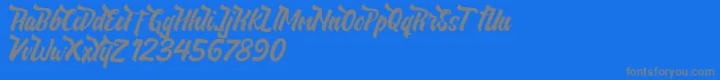 NeldaFree-Schriftart – Graue Schriften auf blauem Hintergrund