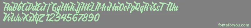 NeldaFree Font – Green Fonts on Gray Background