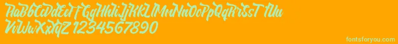 NeldaFree Font – Green Fonts on Orange Background