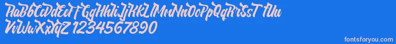 NeldaFree Font – Pink Fonts on Blue Background