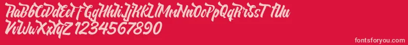 NeldaFree Font – Pink Fonts on Red Background