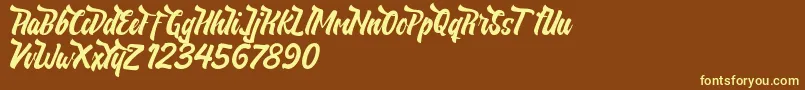 NeldaFree Font – Yellow Fonts on Brown Background